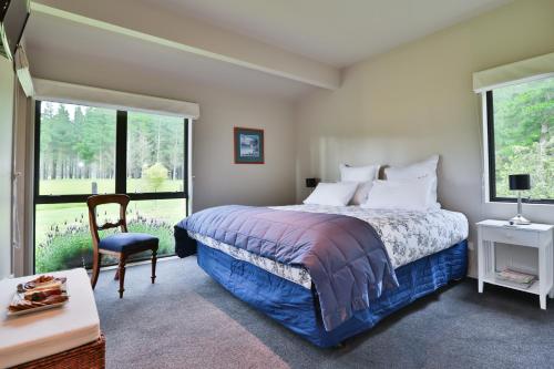 伍德兰公园度假屋客房内的一张或多张床位