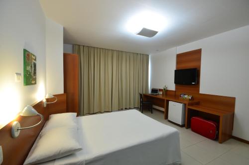 Hotel Serra Grande - SERRA - ES客房内的一张或多张床位