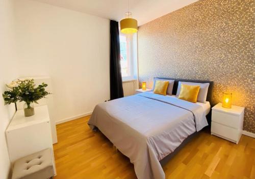 洛迦诺GIOIA@HOME的一间卧室设有一张大床和两个床头柜