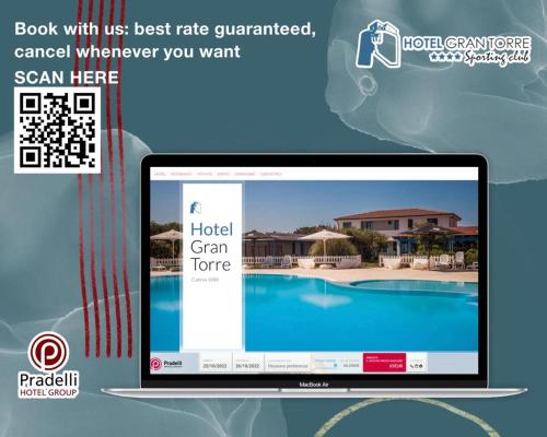 卡布拉斯Hotel Gran Torre的带有酒店宏伟主页的电脑屏幕
