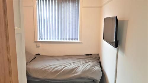Single Bedroom In Withington M20 1 Single Bed, RM4客房内的一张或多张床位