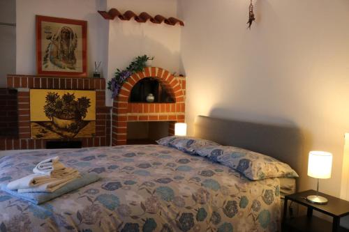 Appartamento Boscodisotto客房内的一张或多张床位