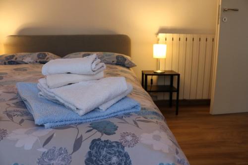 Appartamento Boscodisotto客房内的一张或多张床位
