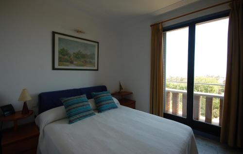 巴塞罗那海景度假公寓客房内的一张或多张床位
