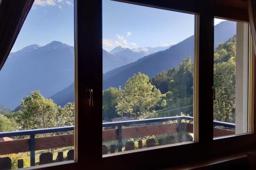 摩德纳迪-坎皮格里奥CASA VIDI的山景窗户