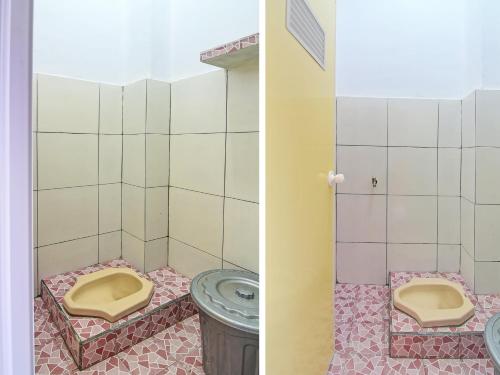 美娜多SPOT ON 91995 Cvictory Inn的浴室的两张照片,配有卫生间和水槽