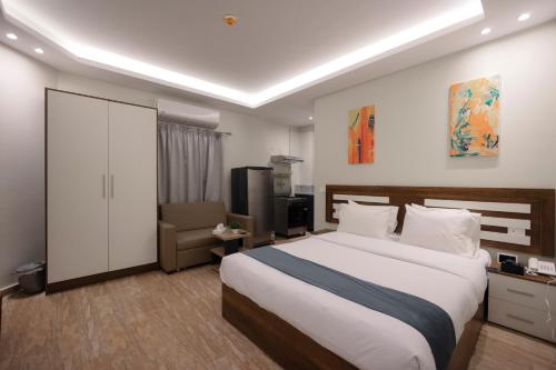 Royal Inn Residence New Cairo客房内的一张或多张床位