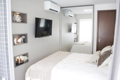 LIV INN Apartamento na Beira-Mar Fortaleza客房内的一张或多张床位