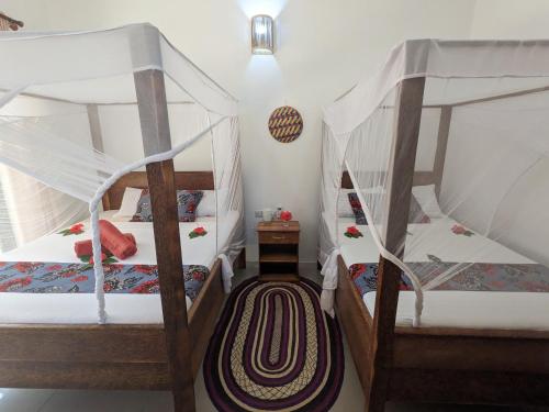 Mkadi Beach House客房内的一张或多张床位