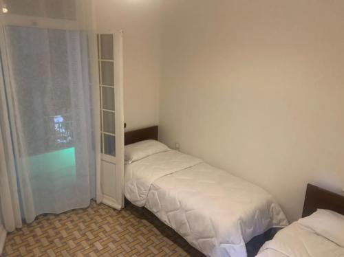 AFRIC HOTEL- Casbah客房内的一张或多张床位