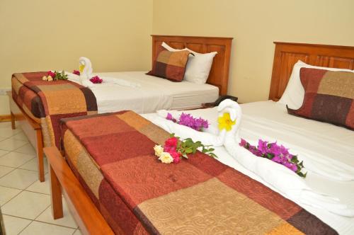 多米尼加克拉斯克国际酒店客房内的一张或多张床位