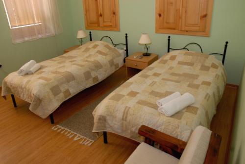Chola Guest House客房内的一张或多张床位