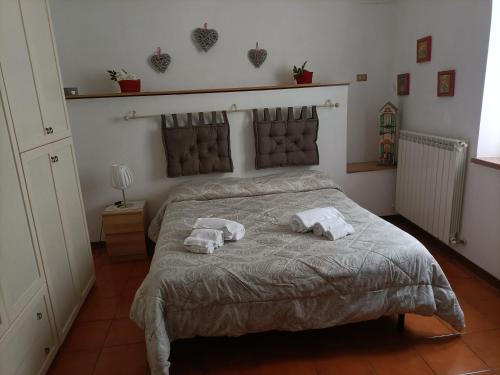Appartamenti Santa Chiara客房内的一张或多张床位