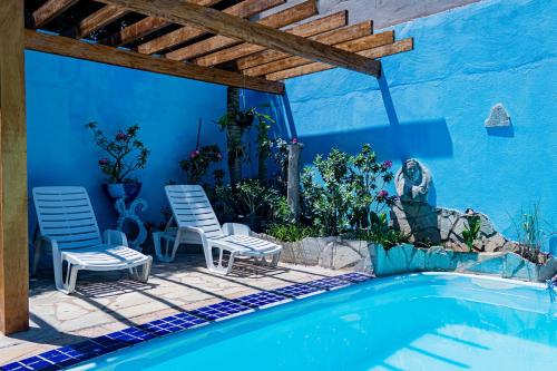 Casa c ótima localização piscina e WiFi, Cuiabá内部或周边的泳池