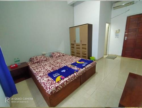 WismaALAS Syariah Guesthouse客房内的一张或多张床位
