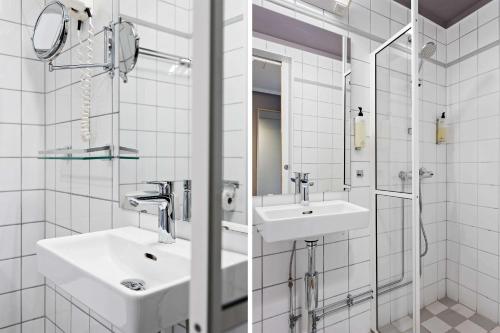 奥斯陆Voksenasen Hotell; Best Western Signature Collection的白色的浴室设有水槽和淋浴。