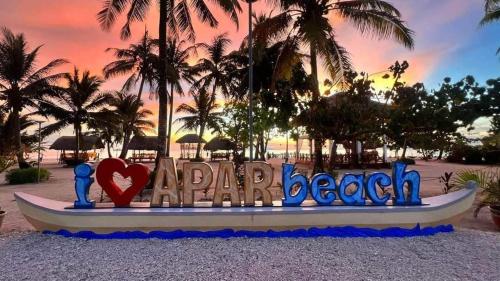 MatabaApar Beach Resort的度假村天堂海滩的标志