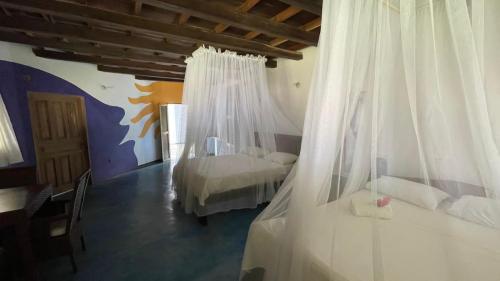 Casa Yuluka en la playa, Palomino客房内的一张或多张床位