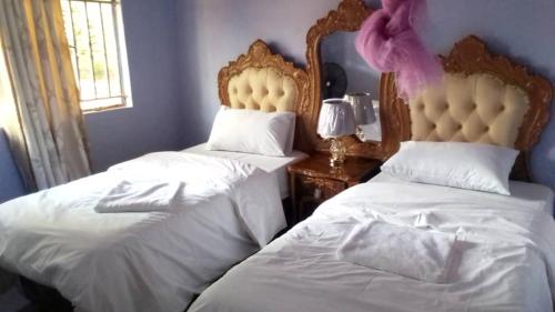Faigib Guest House客房内的一张或多张床位