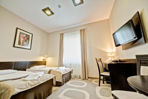 斯托克皮卡罗酒店客房内的一张或多张床位