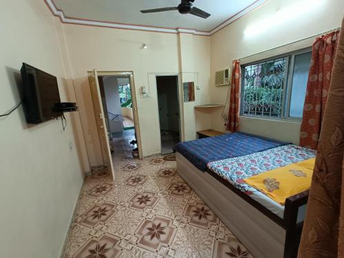 Sahil Residency客房内的一张或多张床位