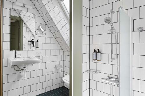 隆德隆德北欧贝斯特维斯特优质酒店的一间带水槽和卫生间的浴室