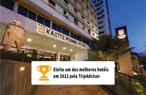 累西腓Kastel Manibu Recife - Boa Viagem的建筑前的标志,有奖杯