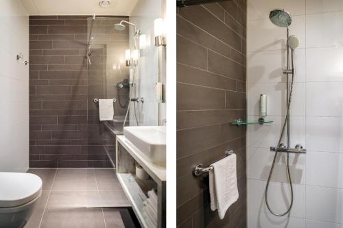 德科赫波斯查德酒店的带淋浴和卫生间的浴室