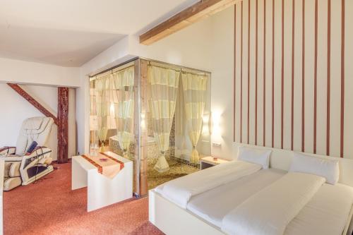 基瓦诺格拉茨酒店客房内的一张或多张床位