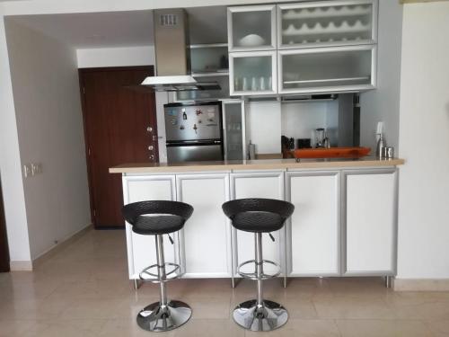 APARTAMENTO MORROS922 LA BOQUILLA con acceso directo a la Playa的厨房或小厨房