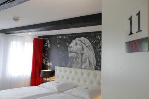 豪斯楚汉萨同盟酒店客房内的一张或多张床位