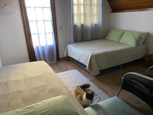 Chalés Búzios客房内的一张或多张床位