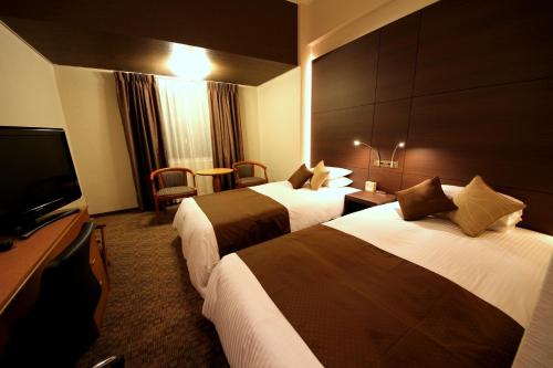 宫平酒店客房内的一张或多张床位