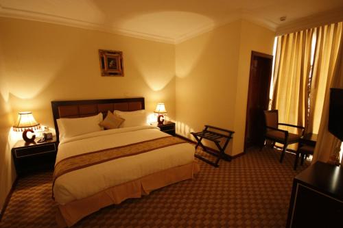 caravan Hotel Addis客房内的一张或多张床位