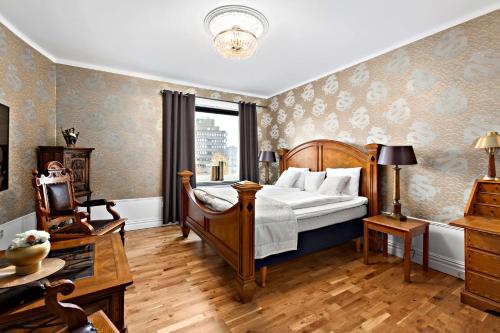 韦特兰达韦特兰达斯坦茨贝斯特韦斯特酒店的一间卧室设有一张床和一个窗口