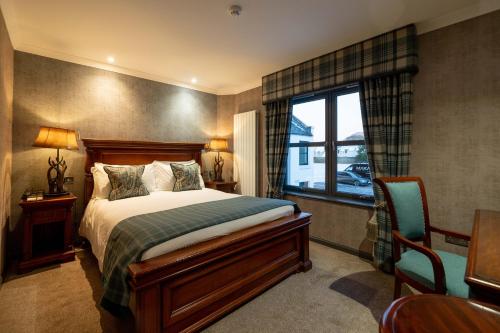 马里卡尔特玛丽卡特之家酒店的酒店客房设有床和窗户。