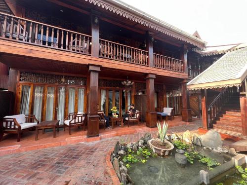 Chaluenxay Boutique hotel餐厅或其他用餐的地方