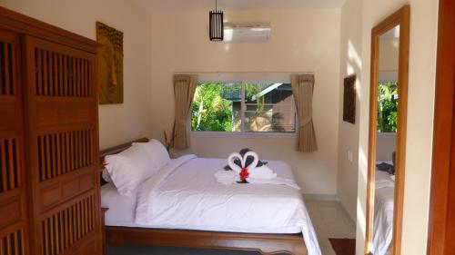 Khao Sok Jasmine Garden Resort - SHA Certified客房内的一张或多张床位