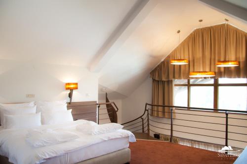 Hotel Danubia Park客房内的一张或多张床位
