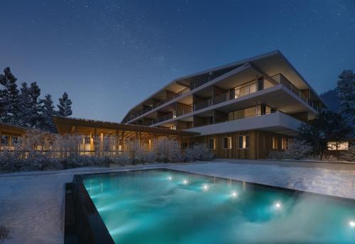 修希Sensoria Dolomites的一座晚上设有游泳池的房子