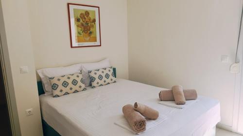 Nikiti luxe appartments客房内的一张或多张床位