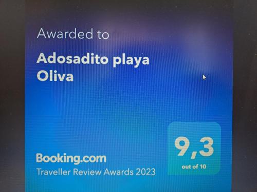 奥利瓦Adosadito Playa Oliva的手机上一个阿迪达斯应用的截图