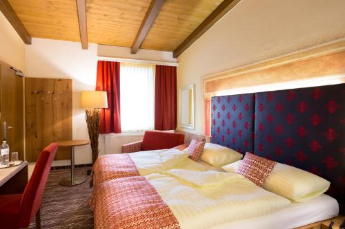 施洛夫加特酒店客房内的一张或多张床位