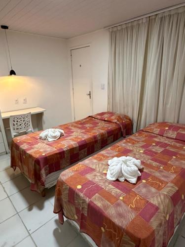 Hotel Pousada Villa Marina客房内的一张或多张床位