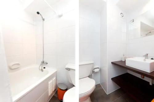 圣地亚哥Apartment located in midtown的白色的浴室设有卫生间和水槽。