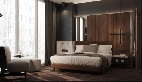 伊斯坦布尔Second Suit Hotel的一间卧室设有一张大床和一个大窗户
