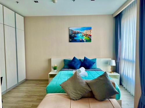 Beachfront Jomtien - Pattaya Smile客房内的一张或多张床位