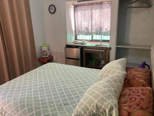 Caribbean Comfort客房内的一张或多张床位