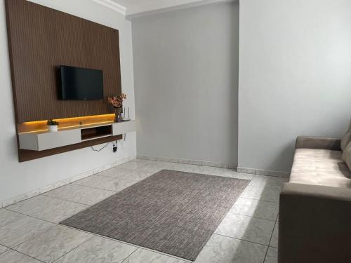 Apartamento amplo, confortável e equipado - Apt 101客房内的一张或多张床位