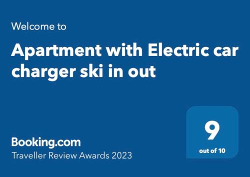 斯朱森Apartment with Electric car charger ski in out的用电动汽车充电器6英寸的预约屏幕